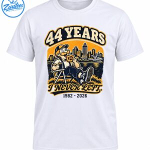 44 Years I Never Left 1982-2026 vintage shirt design with a mustached man relaxing by a city waterfront