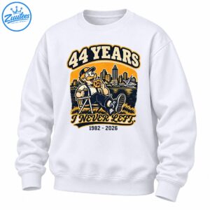 44 Years I Never Left 1982-2026 vintage shirt design with a mustached man relaxing by a city waterfront