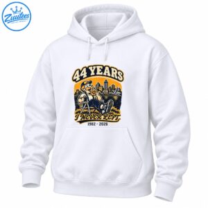 44 Years I Never Left 1982-2026 vintage shirt design with a mustached man relaxing by a city waterfront