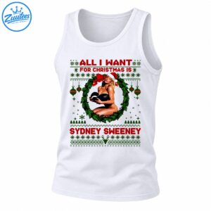 Christmas shirt design with Sydney Sweeney text, a blonde woman in a Santa hat, green holly wreath, red bow, and festive sweater patterns