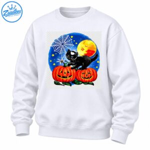 Black-and-white kitten on two grinning orange pumpkins beneath a full moon, stars, and a white spiderweb