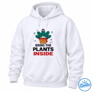 Funny plant lover shirt design with a sad potted plant wearing a Santa hat and red scarf, snowflakes, 32°F, and Bring the Plants Inside text.