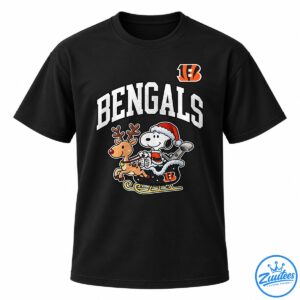 Bengals Snoopy Christmas football shirt design with Snoopy in a Santa suit riding a sleigh with a reindeer beneath bold BENGALS lettering.