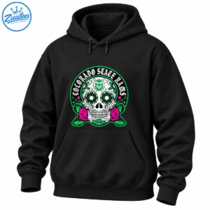Colorado State Rams sugar skull design with white lettering, green floral eye sockets, magenta roses, and green foliage.