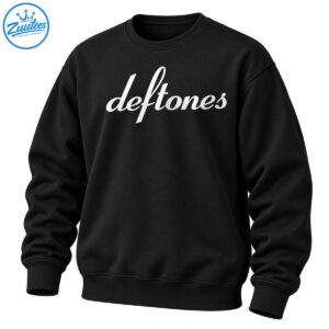 White flowing Deftones script lettering with a distressed texture on a dark background