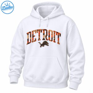 Detroit fall camo shirt design with orange tan and black arched DETROIT lettering and a leaping lion graphic