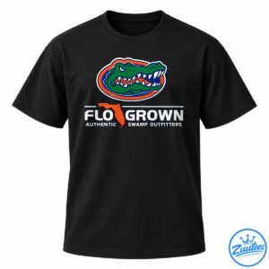 Green snarling alligator graphic with orange and blue oval, Florida silhouette, and FLOGROWN SWAMP OUTFITTERS text