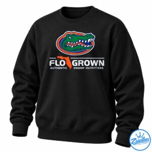 Green snarling alligator graphic with orange and blue oval, Florida silhouette, and FLOGROWN SWAMP OUTFITTERS text