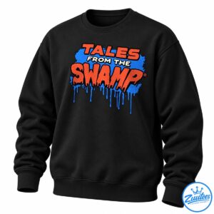 Tales From The Swamp graphic with distressed orange lettering, cream text, black outlines, and dripping blue paint.