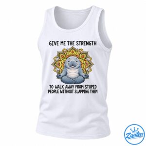 Gray-blue meditating manatee with closed eyes and a colorful yellow, orange, red, and green mandala design.