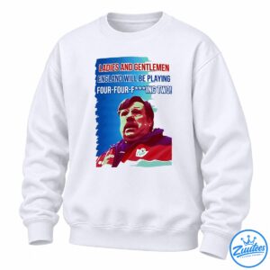 Graham Taylor football shirt design with red and white four-four-fing two lettering and a retro portrait on a blue background.