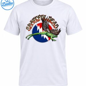 Grateful Dead lettering above a green flying frog with feathered wings and a red blue and white lightning bolt emblem