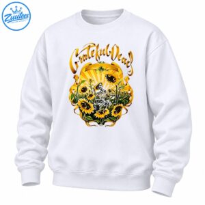 Vintage golden sunflower design with a seated black and white skeleton, green foliage, radiant sunburst, and ornate gold Grateful Dead script