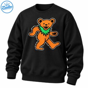 Orange dancing bear with a bright green spiky collar, smiling face, and bold black and cream vintage-style outlines