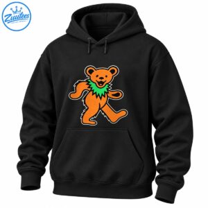 Orange dancing bear with a bright green spiky collar, smiling face, and bold black and cream vintage-style outlines