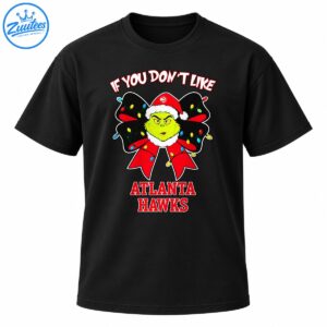 Grumpy green Christmas character in a Santa hat with a red bow, colorful lights, and Atlanta Hawks lettering