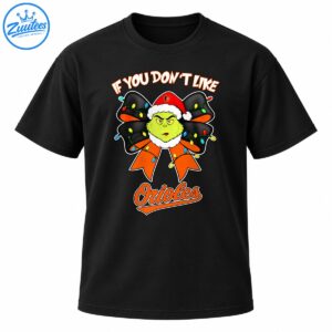 Grumpy green character in a Santa hat with a black and orange bow, colorful Christmas lights, and Orioles lettering