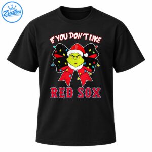 Grumpy green holiday character in a Santa hat with a red bow, colorful Christmas lights, and Red Sox lettering