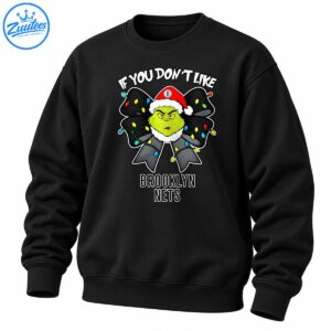 Green Grinch in a Santa hat with a black Christmas light bow and Brooklyn Nets lettering