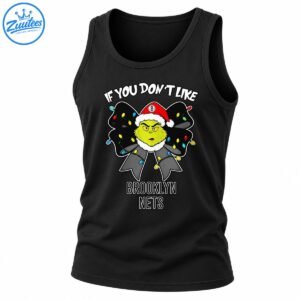 Green grumpy character in a red Santa hat on a black Christmas bow with colorful lights and Brooklyn Nets text