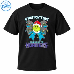 Grumpy green Christmas character in a Santa hat with a colorful light-wrapped blue bow and Charlotte Hornets lettering