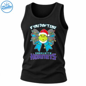 Green Grinch in a Santa hat with a gray and teal Christmas light bow and Charlotte Hornets lettering