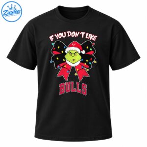 Green Grinch-style face in a Santa hat with a colorful Christmas light bow and bold red BULLS lettering.