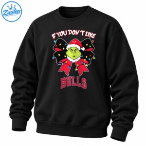 Green Grinch-style face in a Santa hat with a colorful Christmas light bow and bold red BULLS lettering.