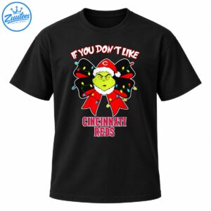Grumpy green Christmas character in a Santa hat on a red and black bow with colorful lights and Cincinnati Reds lettering