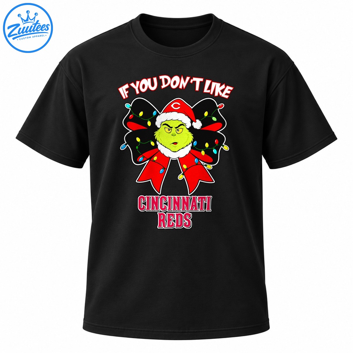 Grumpy green Christmas character in a Santa hat on a red and black bow with colorful lights and Cincinnati Reds lettering Grumpy green Christmas character in a Santa hat on a red and black bow with colorful lights and Cincinnati Reds lettering