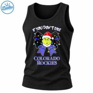 Grumpy green Christmas character in a Santa hat with a purple bow, colorful lights, and Colorado Rockies lettering