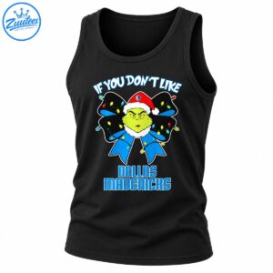 Grumpy green Christmas character wearing a Santa hat with a black and blue light-up bow and Dallas Mavericks lettering