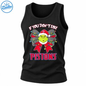Green grumpy Christmas character in a Santa hat with a festive lighted bow and bold red and blue PISTONS lettering