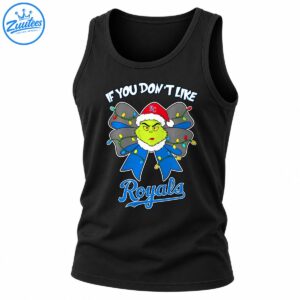 Green Grinch in a red Santa hat with a blue and gray Christmas bow, colorful lights, and Royals lettering