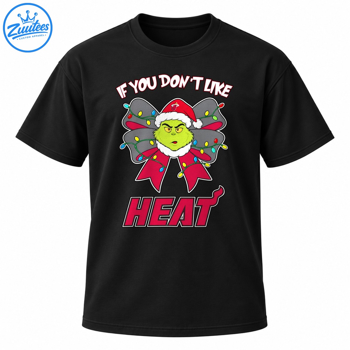 Grumpy green character in a Santa hat with a Christmas light bow and bold red HEAT lettering Grumpy green character in a Santa hat with a Christmas light bow and bold red HEAT lettering