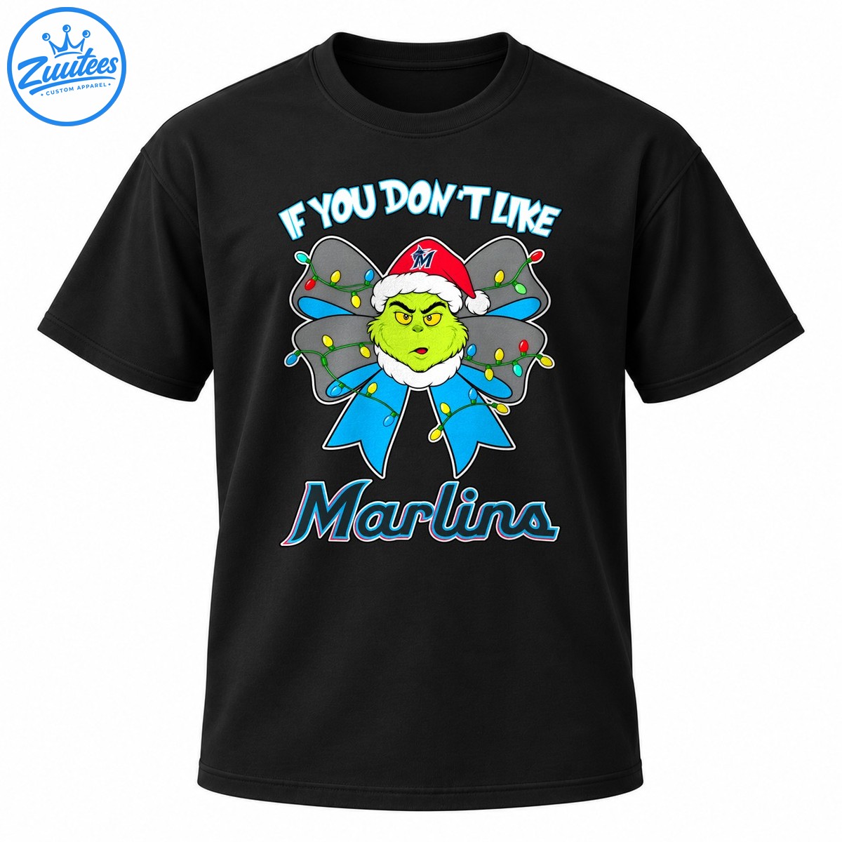 Grumpy green Christmas character in a Santa hat with a blue bow and colorful lights, with Marlins lettering Grumpy green Christmas character in a Santa hat with a blue bow and colorful lights, with Marlins lettering