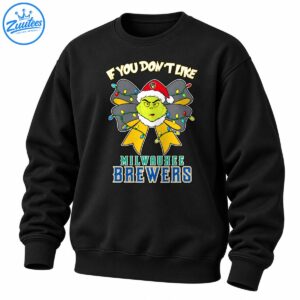 Grumpy green holiday character in a Santa hat with a light-up bow and Milwaukee Brewers lettering