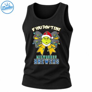 Grumpy green holiday character in a Santa hat with a light-up bow and Milwaukee Brewers lettering