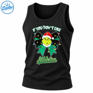 Grumpy green character in a red Santa hat on a Christmas light-covered bow with Athletics lettering