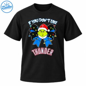 Grumpy green holiday character in a Santa hat on a black bow with colorful lights and bold Thunder lettering
