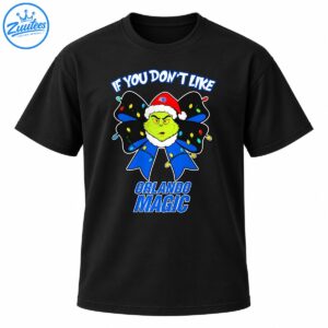 Grinch-inspired face in a Santa hat with a blue and black Christmas bow, colorful lights, and Orlando Magic lettering