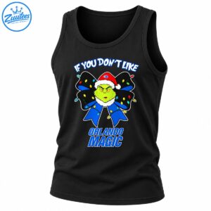 Grinch-inspired face in a Santa hat with a blue and black Christmas bow, colorful lights, and Orlando Magic lettering