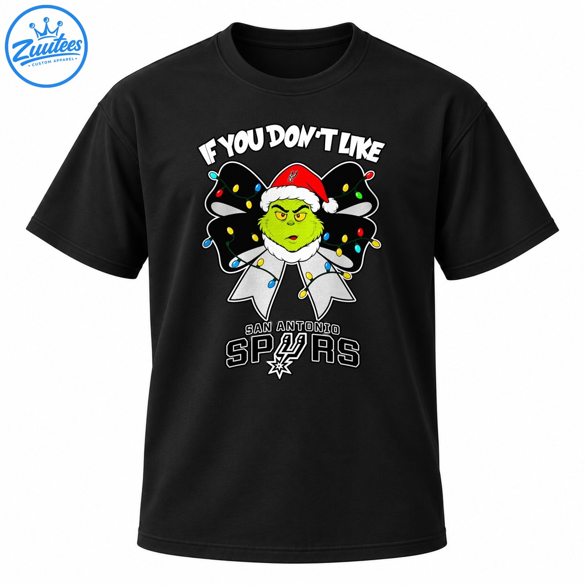 Grumpy green Christmas character in a Santa hat with a light covered black bow and San Antonio Spurs lettering Grumpy green Christmas character in a Santa hat with a light-covered black bow and San Antonio Spurs lettering