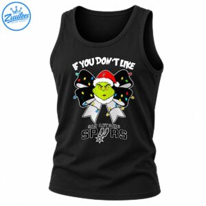 Grumpy green Christmas character in a Santa hat with a light-covered black bow and San Antonio Spurs lettering