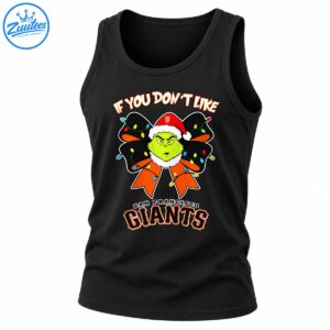 Grumpy green character in a red Santa hat with a black and orange Christmas bow, colorful lights, and San Francisco Giants lettering