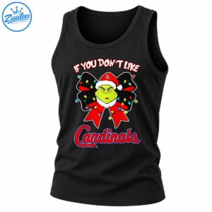 Grumpy green Christmas character in a Santa hat with a red bow, colorful lights, and bold holiday baseball lettering.