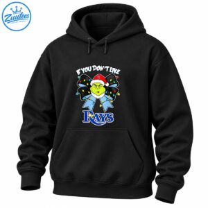Grumpy green character in a red Santa hat with a Christmas light-covered bow and bold blue RAYS lettering