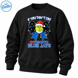 Grumpy green holiday character in a Santa hat on a blue bow with Christmas lights and Toronto Blue Jays lettering
