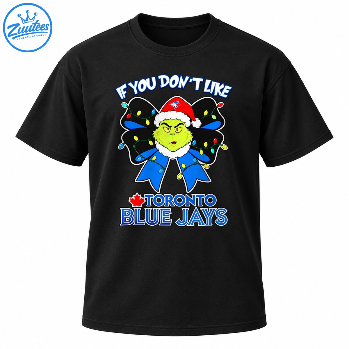Grumpy green character in a Santa hat on a blue bow with Christmas lights and Toronto Blue Jays lettering Grumpy green character in a Santa hat on a blue bow with Christmas lights and Toronto Blue Jays lettering