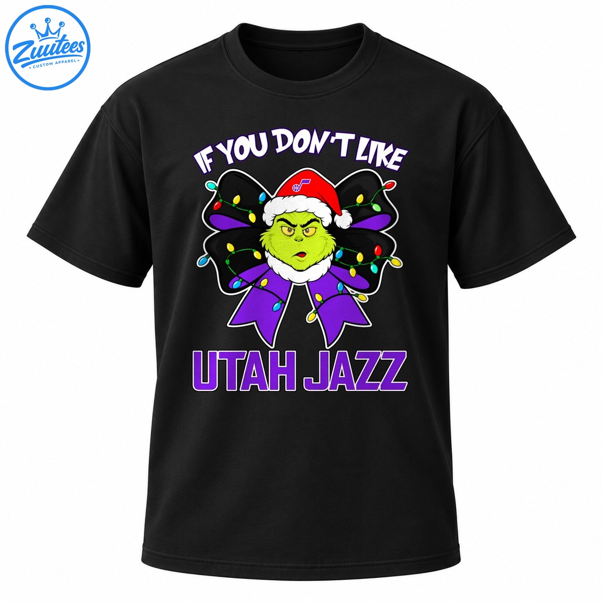 Grumpy green holiday character in a Santa hat on a purple bow with colorful Christmas lights and Utah Jazz lettering Grumpy green holiday character in a Santa hat on a purple bow with colorful Christmas lights and Utah Jazz lettering